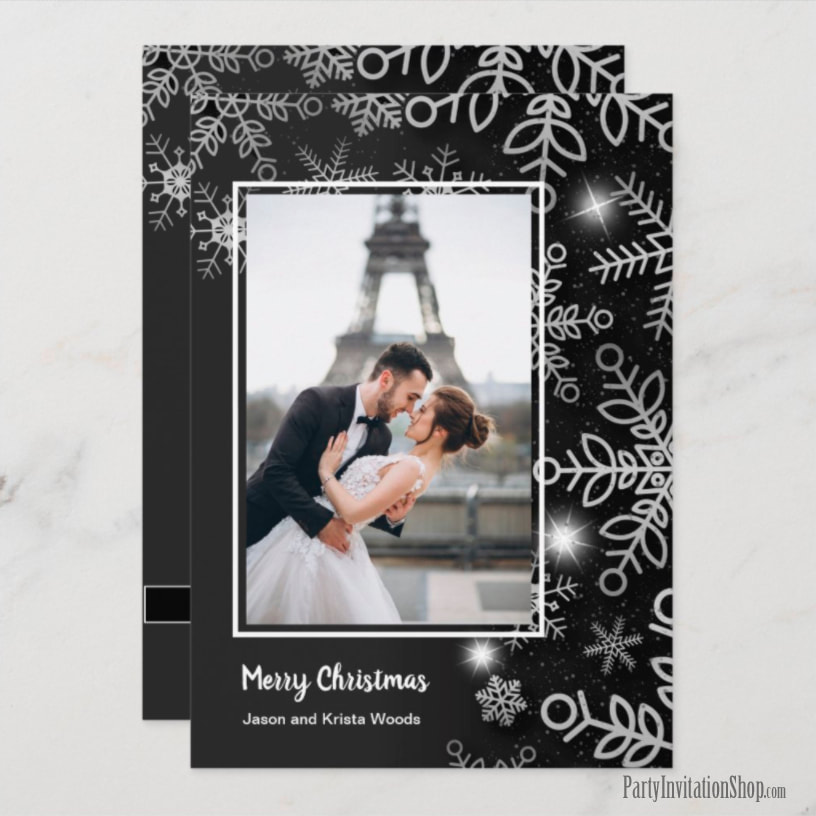 White Snowflakes on Black Christmas Photo Cards at PartyInvitationShop.com