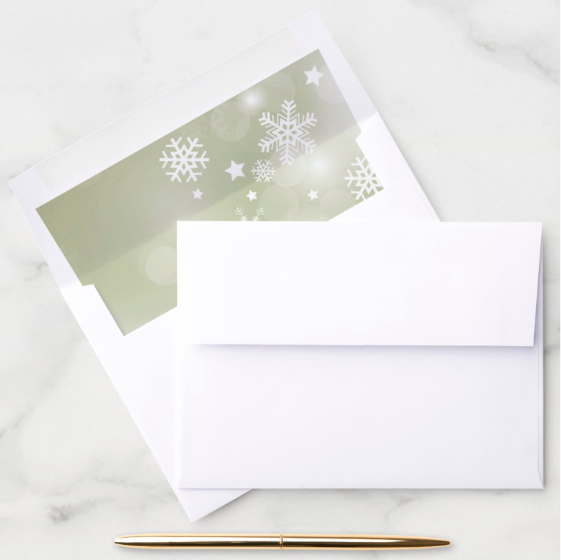 White snowflakes and stars on a beautiful sage green bokeh (blurred lights) background, lined envelopes to match our invitation - perfect for winter themed engagement party invitations, birthday invitations and more, just change the wording. Shop PartyInvitationsShop.com